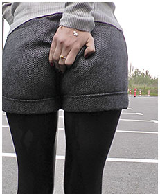 girl wetting herself pissing pantyhose tweed shorts urinating herself 03