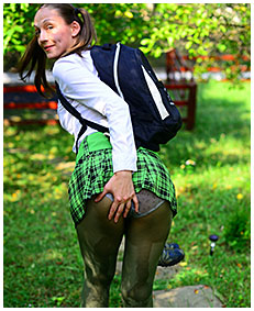 girl pees herself green pantyhose 04