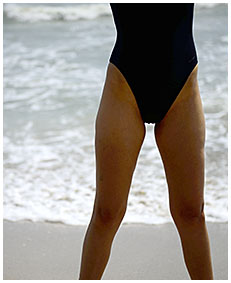 debbie pisses her swimsuit on the beach swim suit pee wetting swimsuits 03