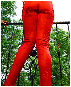 handcuffed lady wets herself peeing her red overalls tights 00