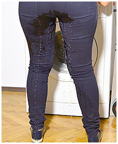 girl wetting jeans pissing herself 02
