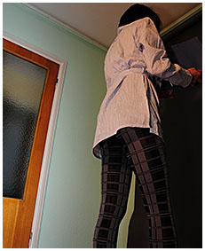 Alice wets herself peeing patterned pantyhose pissing her pants nylons tights 01