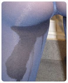 Accidentally pissing my thick blue pantyhose.