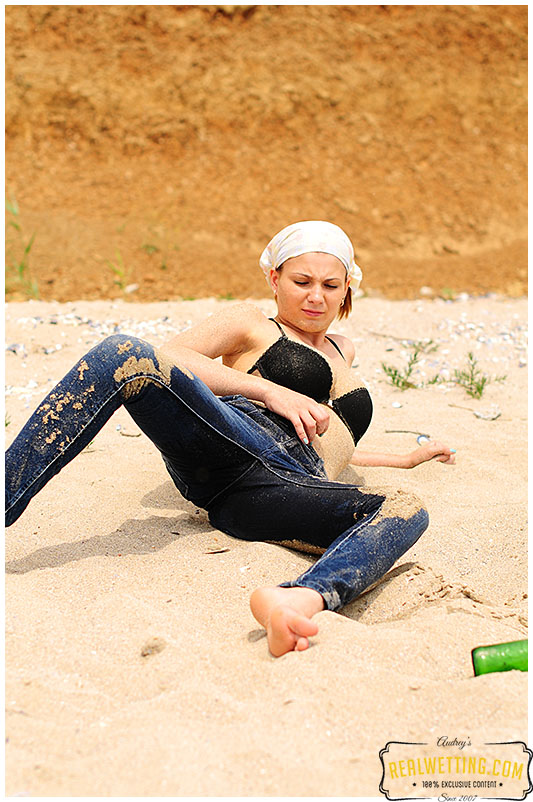 Too drunk to take a piss Alice goes into her tight jeans on the beach