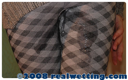 urinating-in-her-tweed-tights-pissing-herself-bursting-bladders-real-wetting-pictures