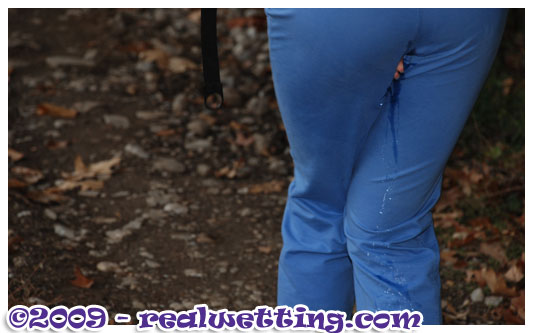 Alice loses control deliberately of her full bladder wetting herself