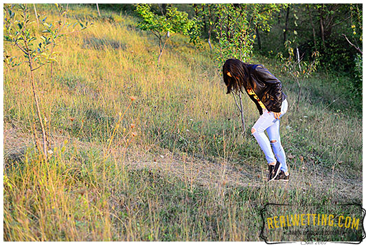 Young girl wets her jeans walking up the trail jeans 