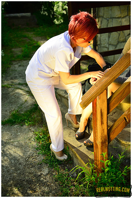 Nurse Dee wets her white uniform