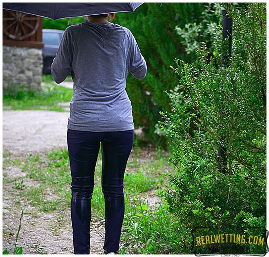 Running from the rain makes lady tight jeans soaking wet with pee