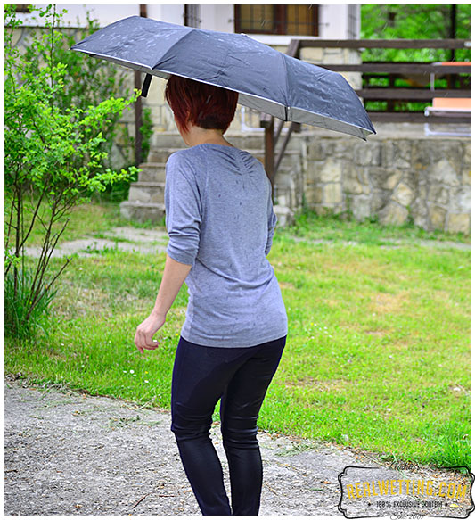 Running from the rain makes lady tight jeans soaking wet with pee