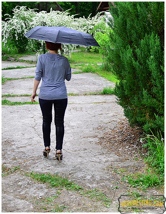 Running from the rain makes lady tight jeans soaking wet with pee