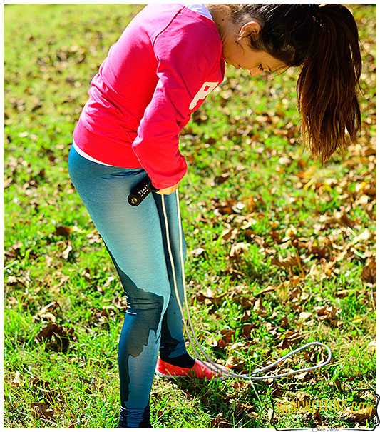 Her piss started flowing once she jumped the rope completly pissing herself