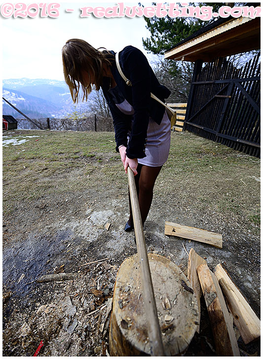 Splitting wood for the fireplace Gemma leaks piss all over herself