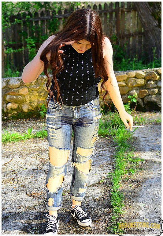 Torn jeans wetting bored with smoking