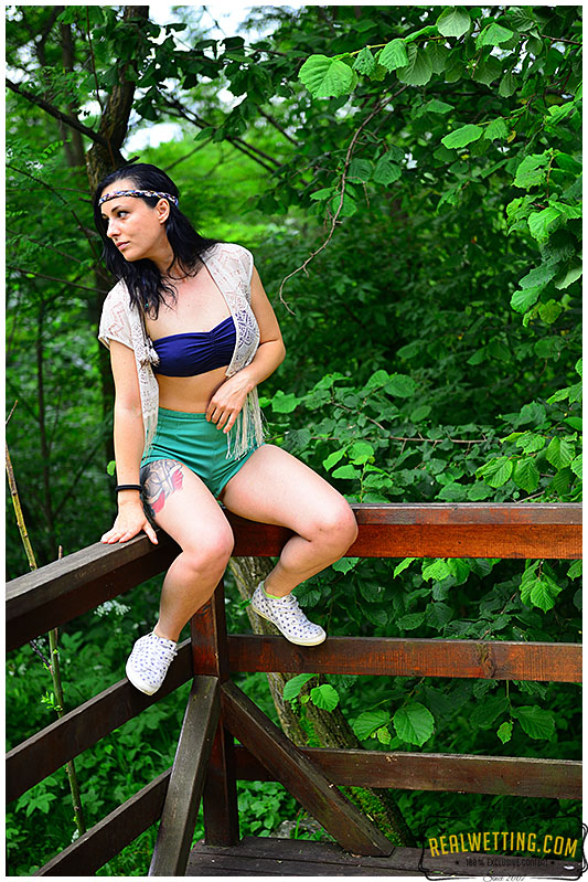 Horny hippie pisses herself wetting shorts