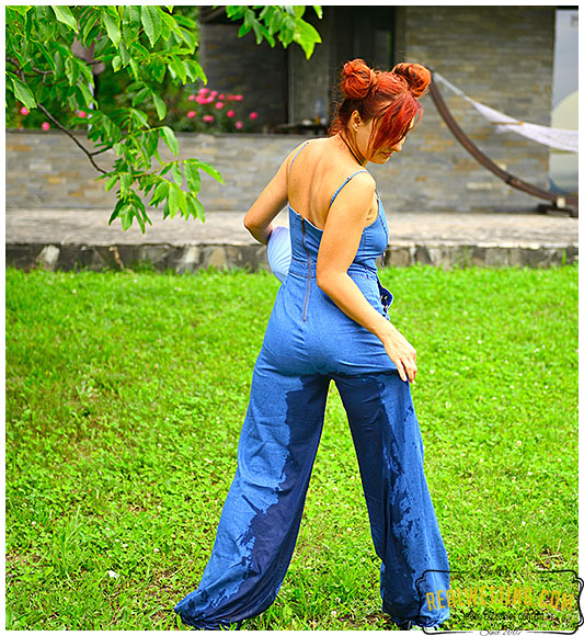 Shocking overalls wearing lady pees her pants desperate to pee