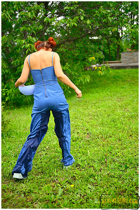 Shocking overalls wearing lady pees her pants desperate to pee