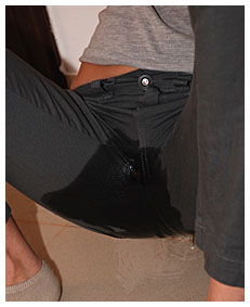natalie bursting piss in her pants on the floor