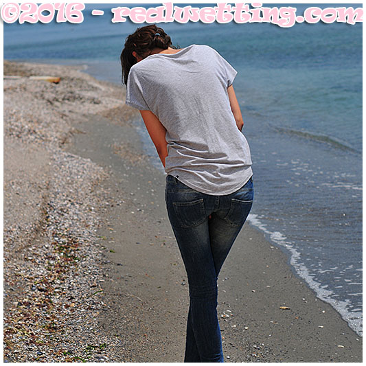 Tight jeans soaking on the beach with Natalie