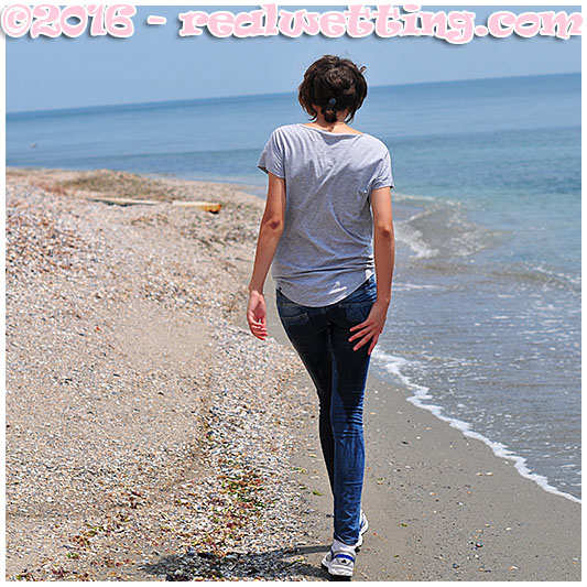 Tight jeans soaking on the beach with Natalie