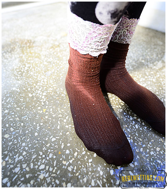 Natalie makes her tights soaking wet when measuring her balcony for renovation