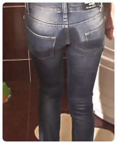 sexy girl lost control of her bladder and pissed her jeans wetting  herself