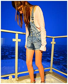 beatrice wets her jeans overalls peeing herself on the balcony 04