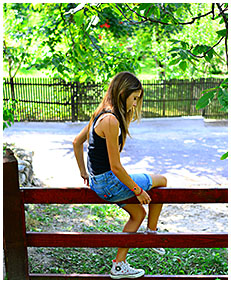 sexy teen pisses her jeans shorts climbing a fence wetting herself pissing her pants 05