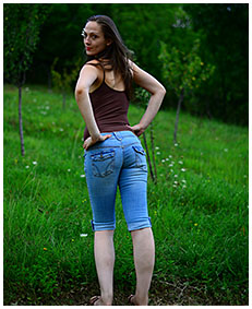 Claudia wets her tight jeans shorts and bodysuit watching the sunset