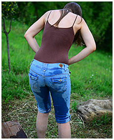 Claudia wets her tight jeans shorts and bodysuit watching the sunset