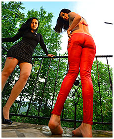 handcuffed lady wets herself peeing her red overalls tights 01