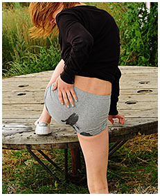 sexy girl wets her shorts on the table pissing cold 03