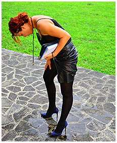 sexy redhead lady pisses her leather skirt and pantyhose leaving in shame with wet pantyhose 2