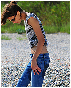 beach desperation natalie wets her blue jeans on the beach pissing herself 00