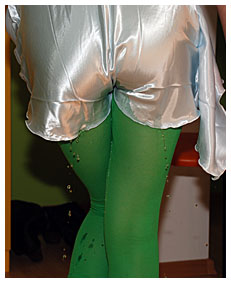 alice gushing piss in her green tights desperate to go the bathroom