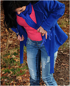 Antonia and Sara take each others pictures as they pee themselves wetting their pants