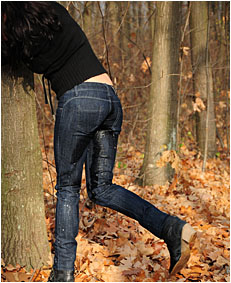 antonia pees her jeans tied to a tree wetting her jeans 02
