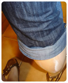 Desperation wetting herself jeans and pantyhose combo.
