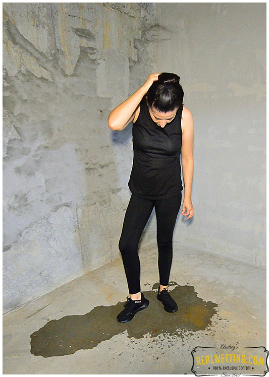 Debbie pissed in her tights while in the underground garage