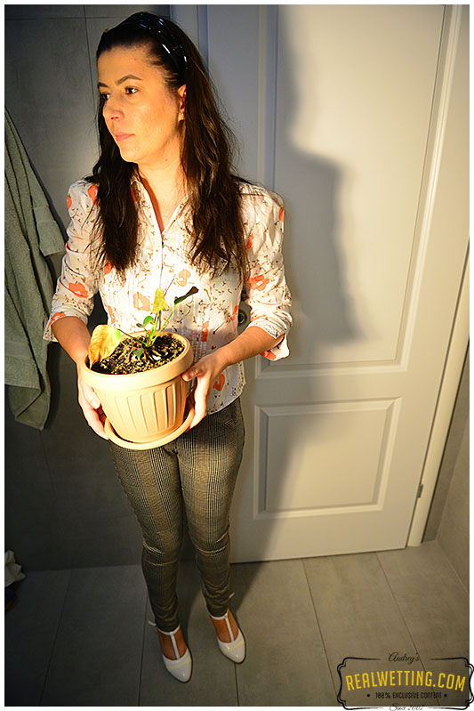 She pissed herself trying to water a plant with her own urine