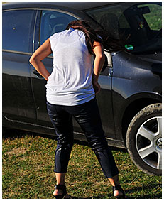 dee pisses her pants on a meadow by the car 01