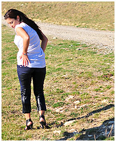 dee pisses her pants on a meadow by the car 03
