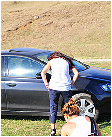 dee pisses her pants on a meadow by the car 04