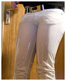 New model Dominika pees in white skin tight jeans