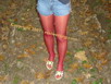 Red pantyhose and denim shorts she is pissing her pants and pantyhose