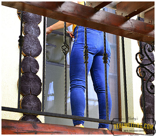 Monica pissed her jeans locked out on the balcony super shiny wetting experience in her jeans