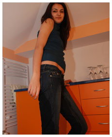 sexy girl natalie pisses her jeans with a full bladder