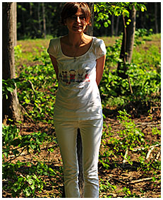 Bound to a tree Natalie wets her white jeans