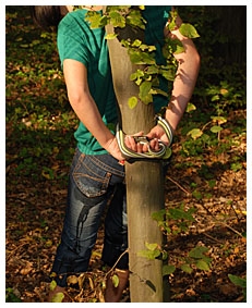 Bound girl Alice wetting her jeans being tied up