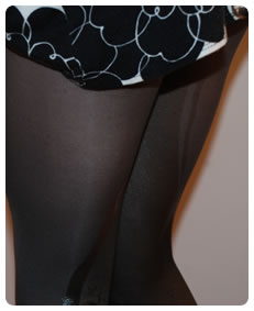 Alice pees dark pantyhose